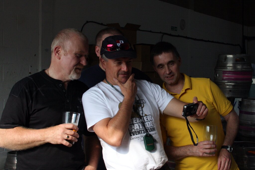 Admiring photos of Redemption Brewery