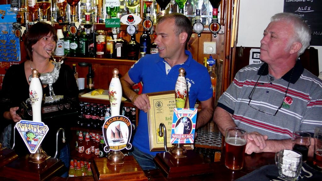 Ray and Jo from The Red Lion, Preston with their PotY award